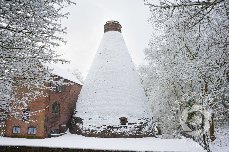 Snow covered bottle kiln at the Coalport China Museum, one of the Ironbridge Gorge Museums, at Coalport, Shropshire.