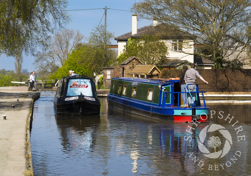 Canal boats at Grindley Brook locks, near Whitchurch, Shropshire, England.