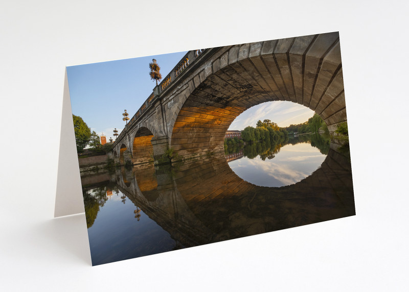 Welsh Bridge reflected in the River Severn at Shrewsbury, Shropshire.