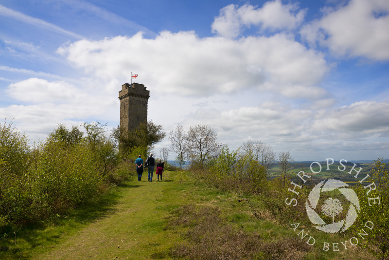 Walkers approach Flounders' Folly on Callow Hill near Craven Arms, Shropshire, England.