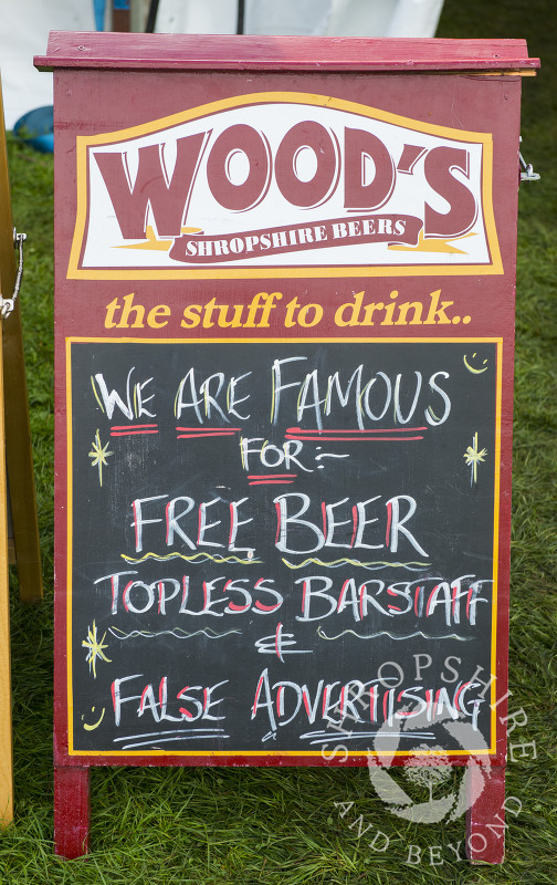 Wood's Brewing Company advertising board at Ludlow Food Festival, Shropshire.