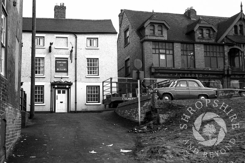 The Unicorn Inn and J C Lloyd grocer's shop in Park Street, Shifnal, Shropshire, in 1965.