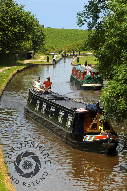 Canal boats on the Shropshire Union Canal at Tyrley Locks, near Market Drayton, Shropshire, England.