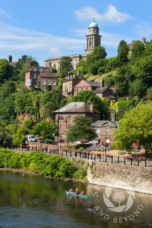St Mary's Church overlooking canoeists on the River Severn at Bridgnorth, Shropshire.