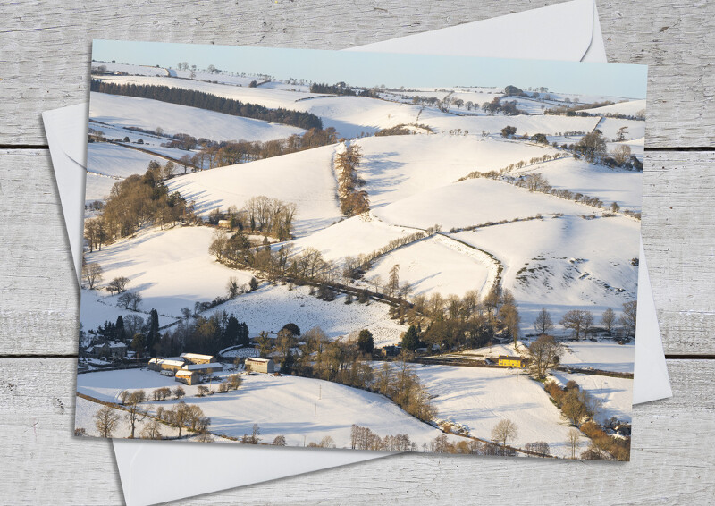 Snow covers Offa's Dyke and Newcastle on Clun, Shropshire.