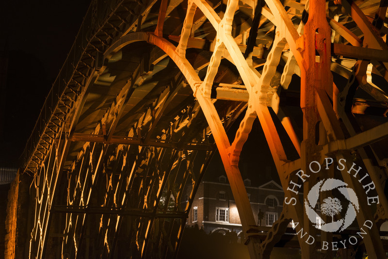 The Iron Bridge at Ironbridge, Shropshire, England. It was illuminated as part of the Night of Heritage Light, celebrating UNESCO world heritage sites.