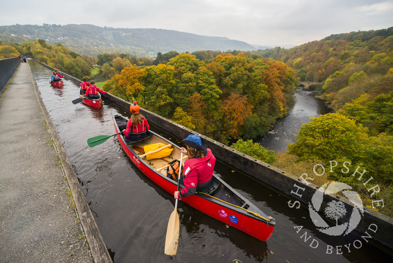 Canoeists on the Llangollen Canal above the River Dee on the Pontcysyllte Aqueduct, near, Wrexham, Wales.