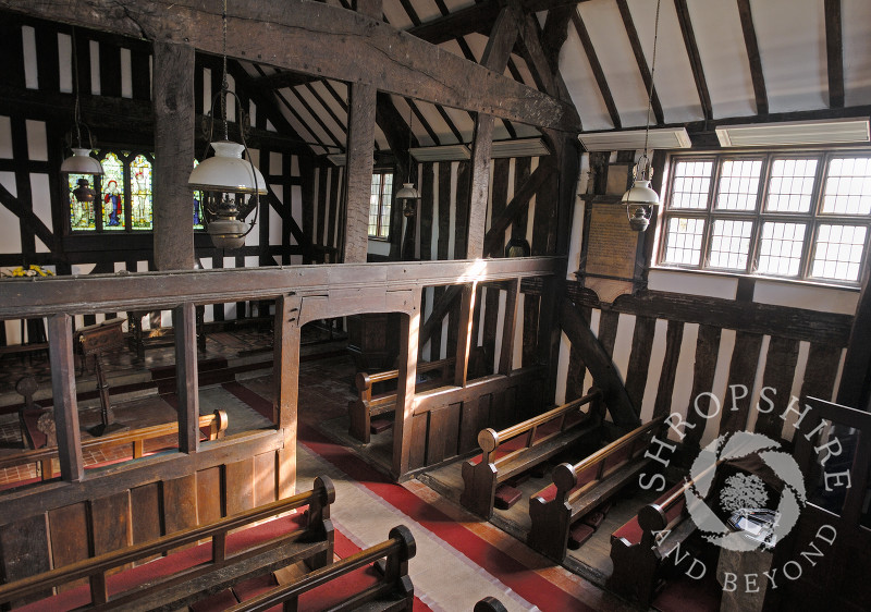 The timbered interior of St Peter's Church in Melverley, Shropshire.