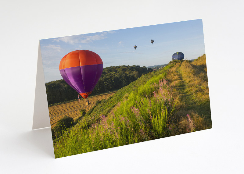 Hot air balloons over Old Oswestry Hill Fort, Shropshire.