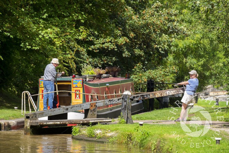A narrowboat negotiates Adderley Locks on the Shropshire Union Canal, Shropshire.