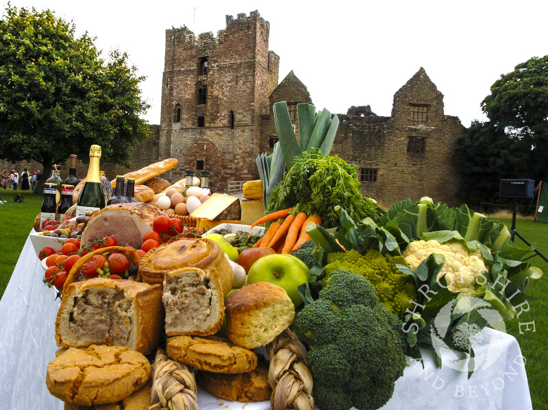 A table of produce on display in the grounds of Ludlow Castle during Ludlow Food Festival, Shropshire.