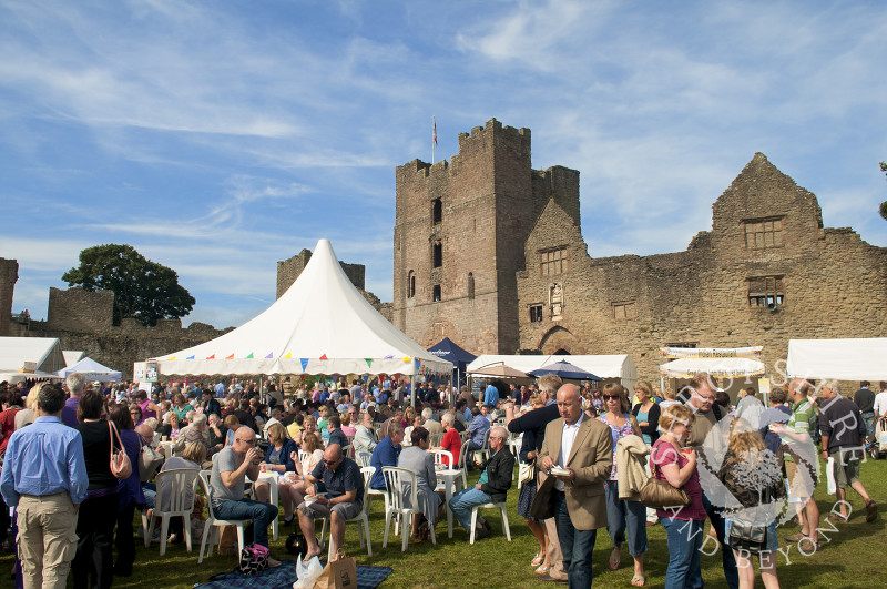 Visitors throng the castle grounds during the Ludlow Food Festival, Shropshire, England.