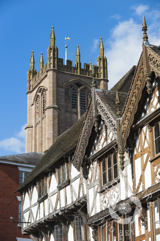 St Laurence's Church towers above half-timbered buildings in Ludlow, Shropshire, England.