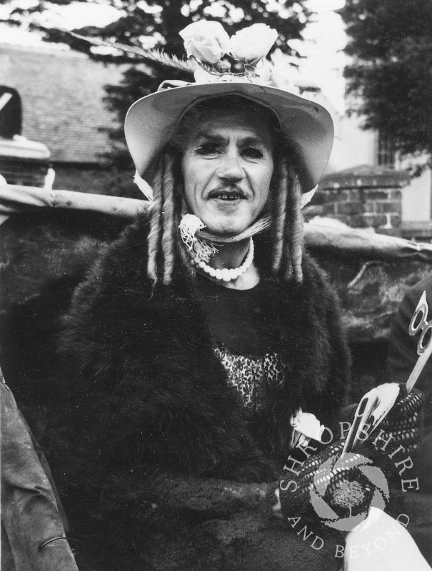 Carnival character on one of the floats in Shrewsbury Road, Shifnal, Shropshire, in the 1950s.