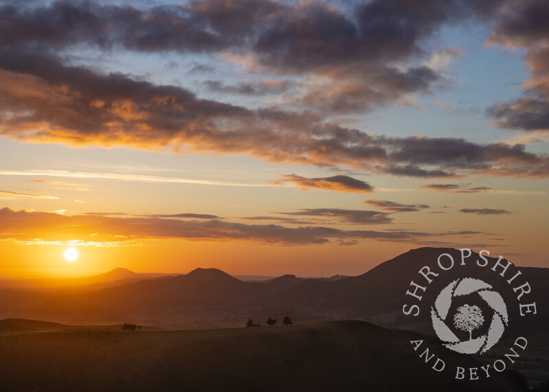 The Stretton Hills and the Wrekin at sunrise, seen from the Long Mynd, Shropshire.