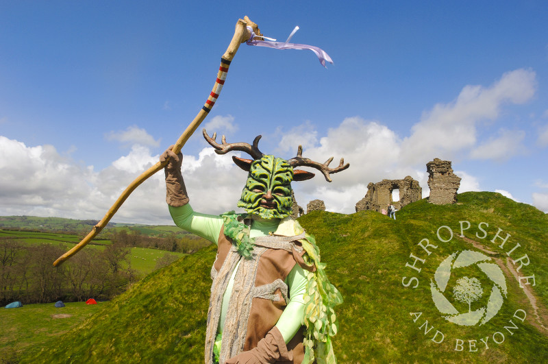 The Green Man in front of Clun Castle, Clun Green Man Festival, Shropshire.