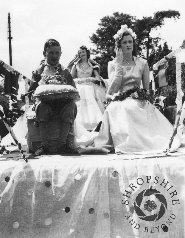 The Carnival Queen float in Shifnal, Shropshire, during the town's annual carnival, 1950s.