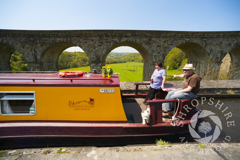 A canal boat on the Llangollen Canal at Chirk Aqueduct, on the England/Wales border.