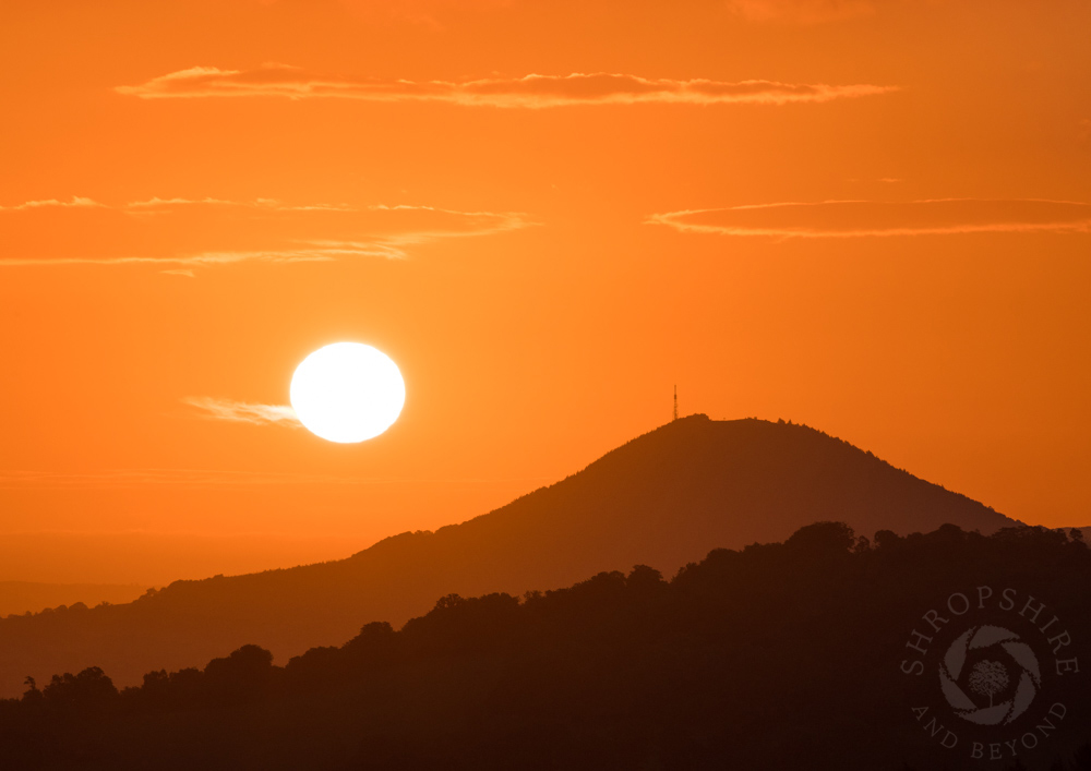 Dramatic light as sun comes up over Wrekin