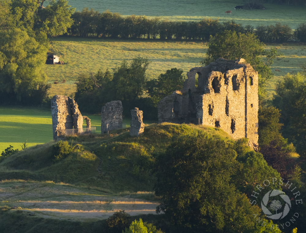 Sunrise and shadows at Clun Castle