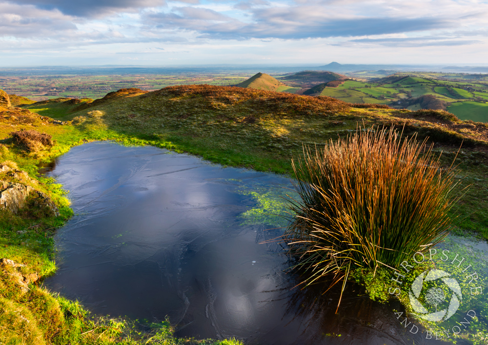 Sunshine and ice on the summit of Caradoc