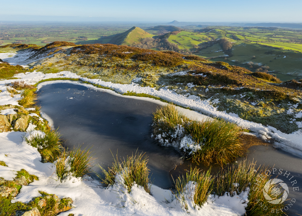 Sunshine and snow on Caer Caradoc