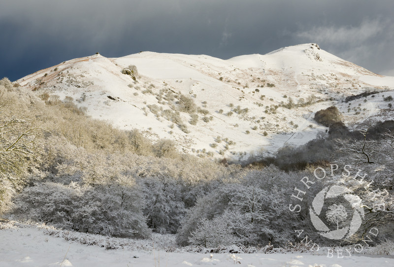 A snow-covered Caer Caradoc at Church Stretton, Shropshire.