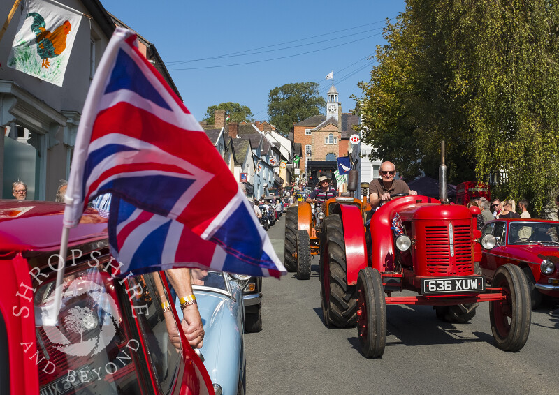 Parade of tractors at the Michaelmas Fair, Bishop's Castle, Shropshire.
