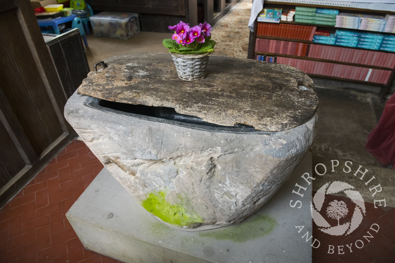 The ancient font which may date back to Saxon times in St Michael and All Angels Church, Smethcote, Shropshire.