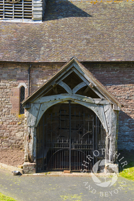 The entrance to the 13th century Church of St Michael and All Angels at Stanton Long, Shropshire.