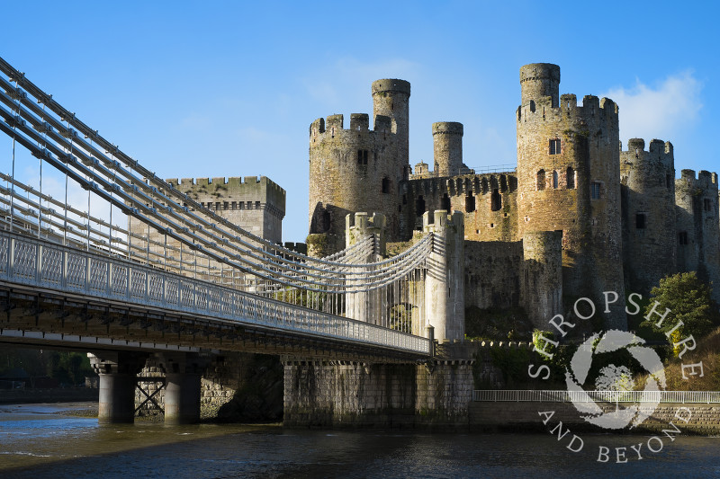 Medieval Conwy Castle and suspension bridge in Conway, North Wales.