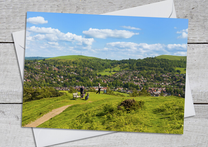 Golfers on the Long Mynd overlooking Church Stretton, Shropshire.