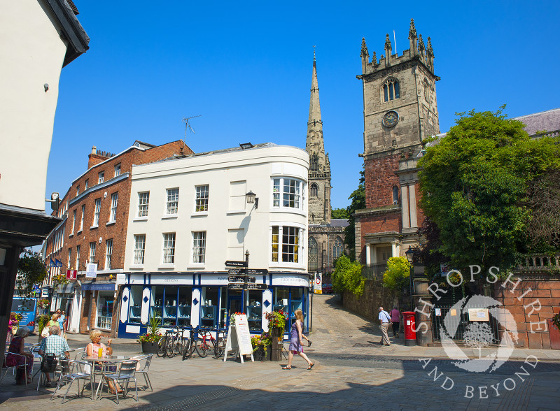 A summer scene in High Street, overlooked by the churches of St Julian and St Alkmund, Shrewsbury, Shropshire, England.
