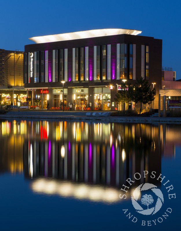 Premier Inn reflected in the lake at Telford, Shropshire, England.