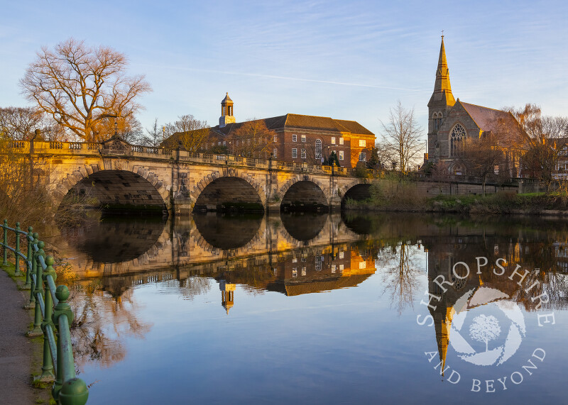 English Bridge reflected in the River Severn at sunrise, Shrewsbury, Shropshire.