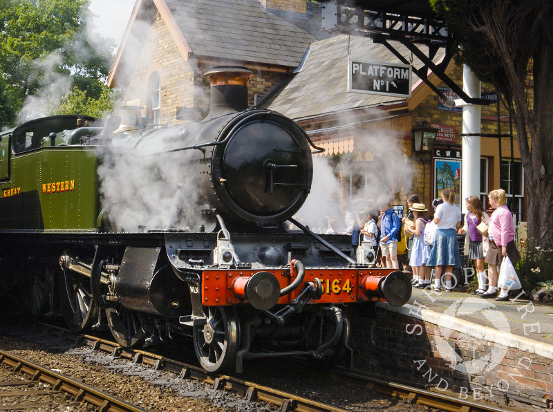A GWR 5164 Large Prairie steam locomotive pulls into Hampton Loade Station, Severn Valley Railway, Shropshire. 
