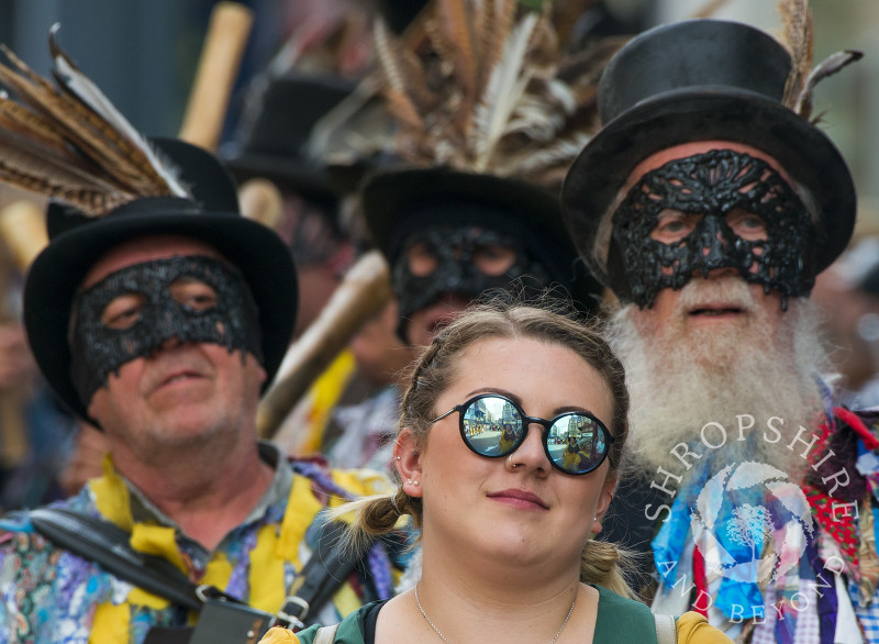 Shropshire Bedlams morris dancers taking part in a morris dance procession at Shrewsbury Folk Festival.