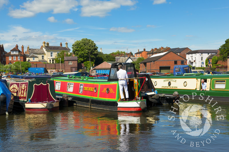 A narrowboat moors in the canal basin at Stourport-on-Severn, Worcestershire, England.