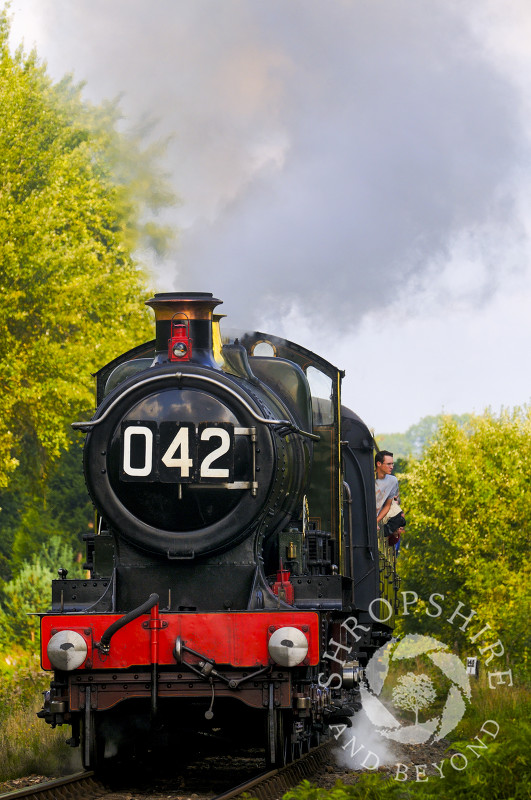 The City of Truro locomotive steams out of Hampton Loade Station, Severn Valley Railway, Shropshire, England.