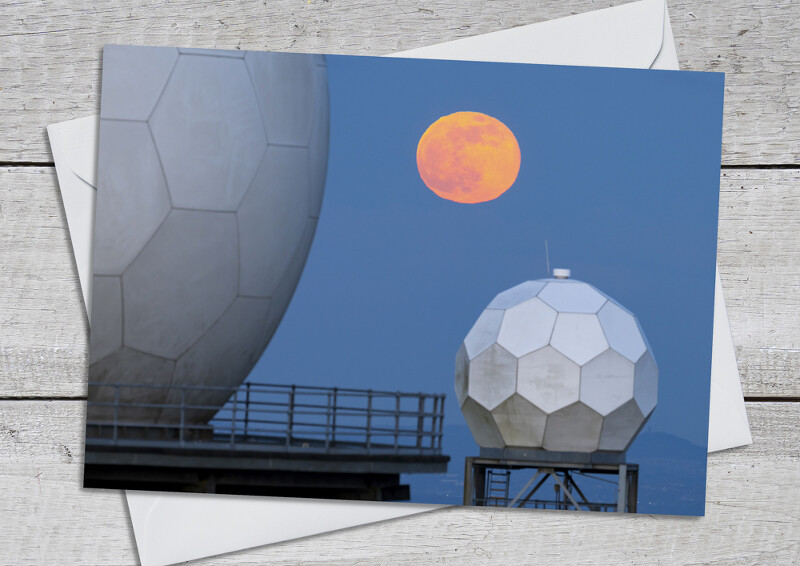 Moonrise over the radar domes on Titterstone Clee, Shropshire.