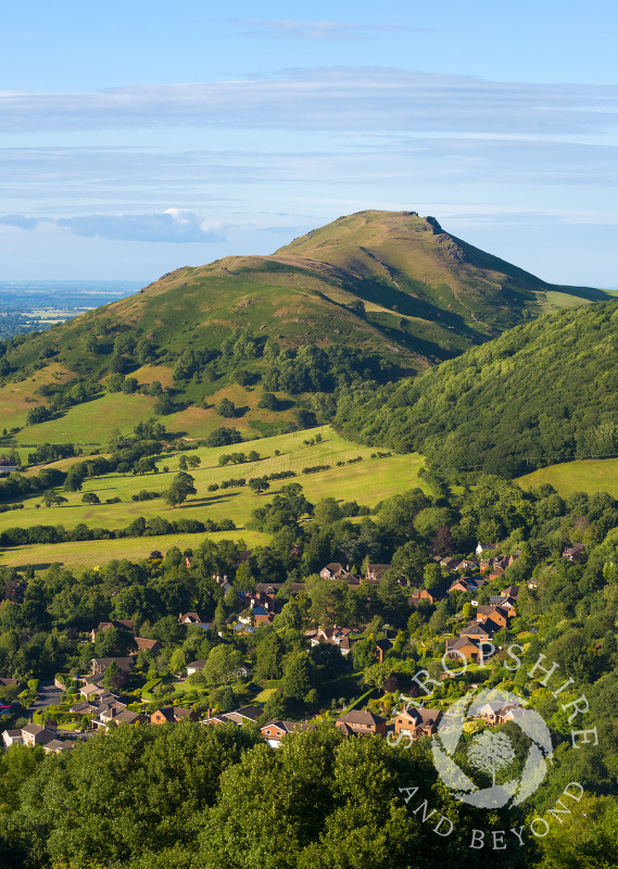 Evening light on Caer Caradoc and Church Stretton, seen from Ragleth, Shropshire.