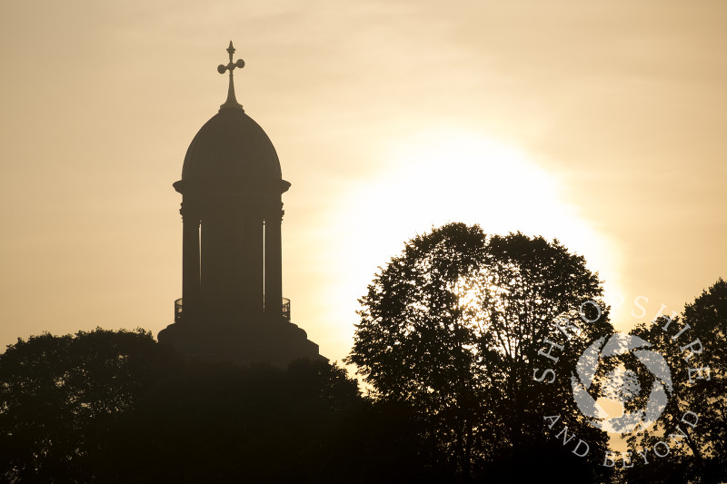 Sunrise silhouettes the tower of St Chad's Church in Shrewsbury, Shropshire.