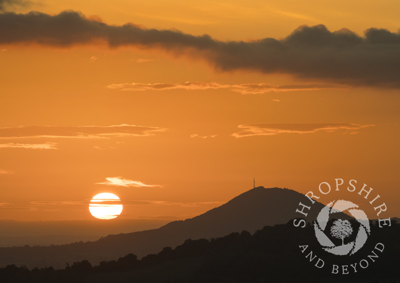 The Wrekin at sunrise, seen from the Lawley, near Church Stretton, Shropshire.