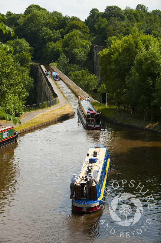 Narrowboats crossing Chirk Aqueduct, Wrexham, Wales.