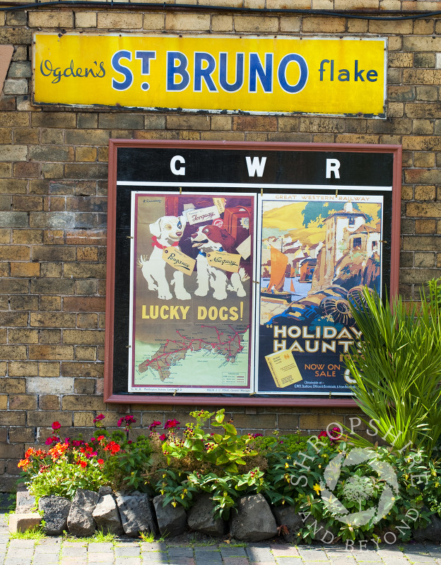 Vintage advertising signs on the platform at Hampton Loade Station, Severn Valley Railway, Shropshire, England.