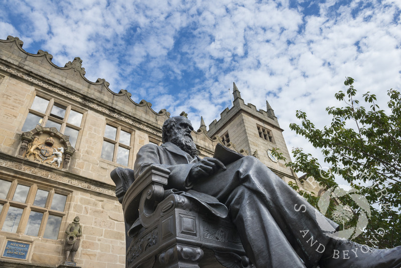 Statue of Charles Darwin outside the library in Shrewsbury, Shropshire, England.