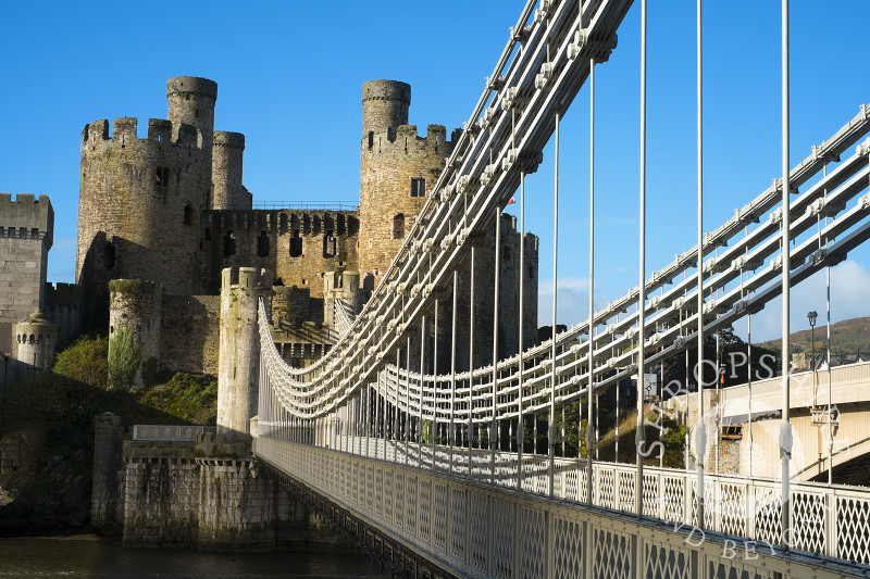 Medieval Conwy Castle and suspension bridge in Conway, North Wales.