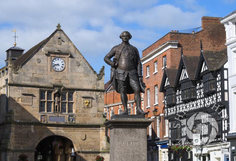 Statue of Robert Clive and the Old Market Hall in the Square, Shrewsbury, Shropshire.