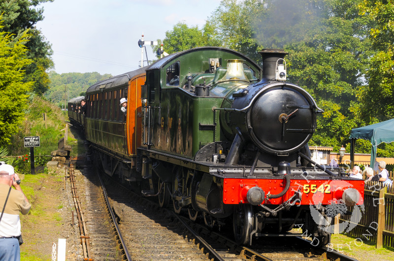 A Small Prairie GWR steam locomotive pulls into Hampton Loade Station, Severn Valley Railway, Shropshire, England.