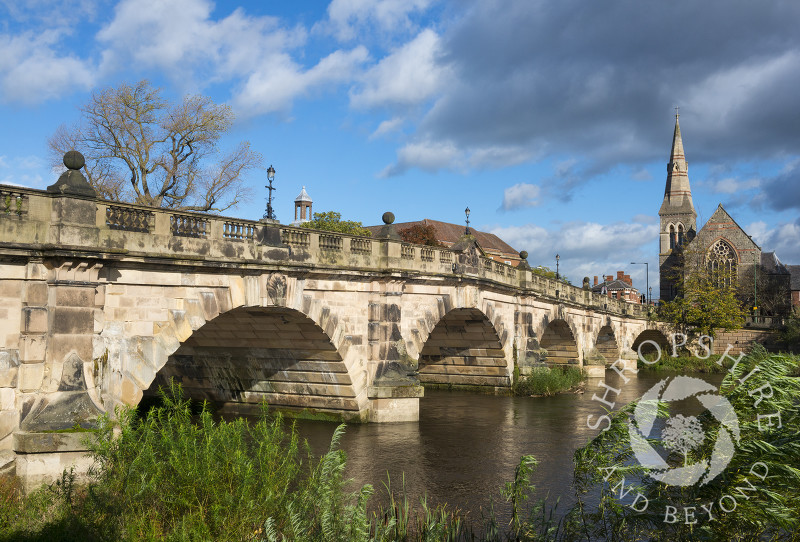 Autumn sunlight on English Bridge and the River Severn in Shrewsbury, Shropshire.